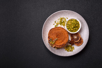 Round puff pastry croissant with pistachio filling or new york roll