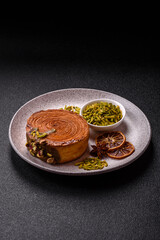 Round puff pastry croissant with pistachio filling or new york roll