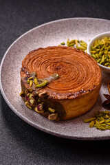 Round puff pastry croissant with pistachio filling or new york roll