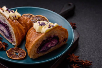 Sweet crispy fresh croissant with berry filling