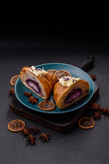 Sweet crispy fresh croissant with berry filling