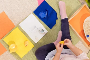 Montessori sorting activity with colorful objects © aprilante