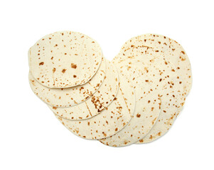 A stack of corn tortillas on a white background