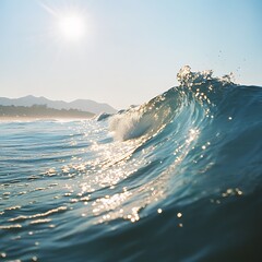 Obraz premium A photograph of an ocean wave, taken from the water's edge with sunlight reflecting off its surface