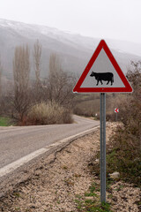 Livestock Crossing Sign on Rural Road
