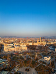 Fototapeta premium Vienna cityscape showing MuseumsQuartier and Naturhistorisches Museum during sunset aerial view