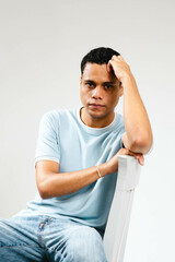 young man sitting on sofa