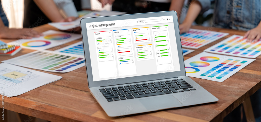 Leinwandbilder Project planning software for brisk business project management on the computer screen showing timeline chart of the team project