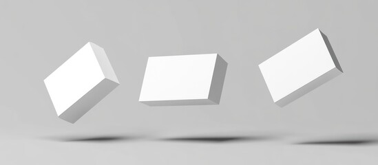 Three Floating White Rectangular Boxes Against A Gray Background