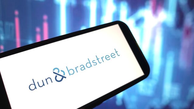 Konskie, Poland - March 18, 2025: Dun and Bradstreet company logo displayed on mobile phone