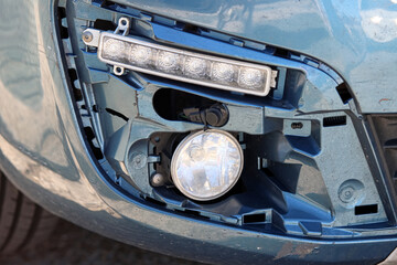 Obraz premium Hit on the car, front headlight broken.