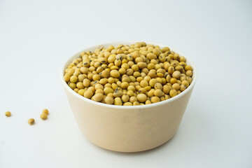 soybeans in a wooden bowl. top view