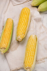 yellow sweet corn on wooden background