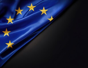 European union flag with yellow stars on blue fabric background