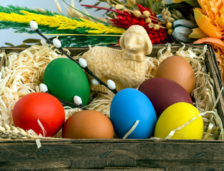 painted eggs in different colors, butter lamb, background, wallpaper, motif and symbol of Easter © K.Jagielski