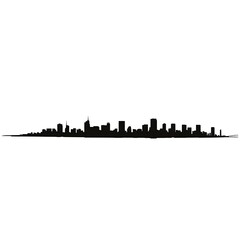 Fototapeta premium A silhouetted urban skyline composed of numerous various buildings and towers