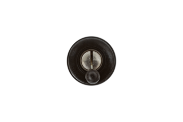 A vintage black plastic switch is isolated.
