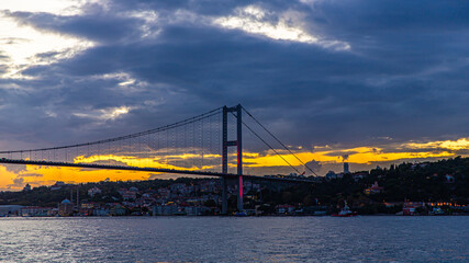 The bosphorus bridge connecting Europe and Asia in Turkey, by sunset