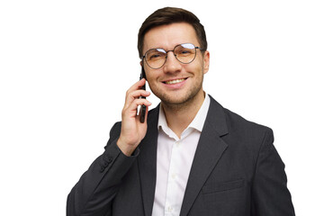 Business professional smiling while talking on mobile phone in a studio setting during the day