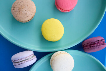 Colorful Macarons in Vibrant Dessert Scenes