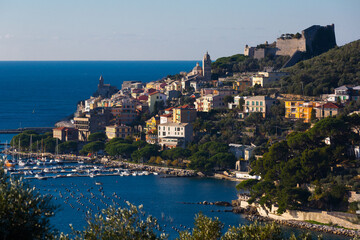 Fototapeta premium Portovenere La Spezia apartments and boats from sea view at Italy at sunny day..