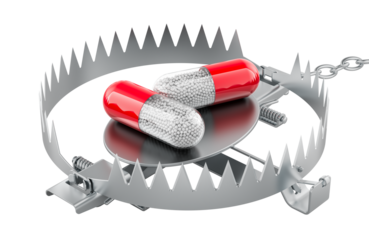 Drug addiction from medicines concept. Medicament capsule inside bear trap, 3D rendering isolated on transparent background