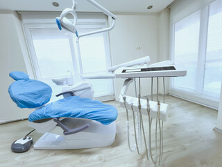 a bright and spacious dentist's office with a modern dental chair