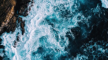 Aerial View of Ocean Waves Crashing Against Rocky Coastline &ndash; Dramatic Seascape with Turbulent Waters
