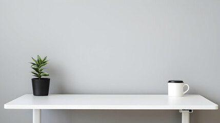 Empty White Desk With Plant And Coffee Cup