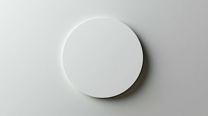 Minimalist white circle on white background.