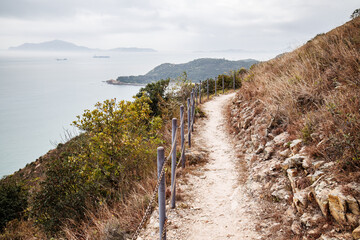 Scenic Coastal Hiking Trail Overlooking a Secluded Beach in Hong Kong