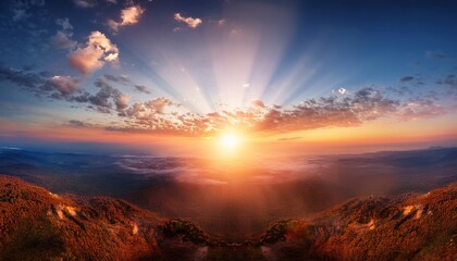 Obraz premium majestic ascent of sun, casting its radiant beams upon vast expanse of heavens, heralds dawning of a fresh chapter in eternal cycle of existence