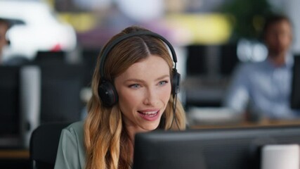 Customer support representative talking wearing headset in call center closeup.  - Powered by Adobe