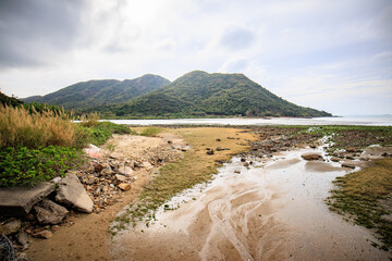 Low Tide Exposes Rocky Shoreline and Tidal Flats