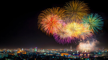 Fototapeta premium Colorful Fireworks Over City Skyline at Night