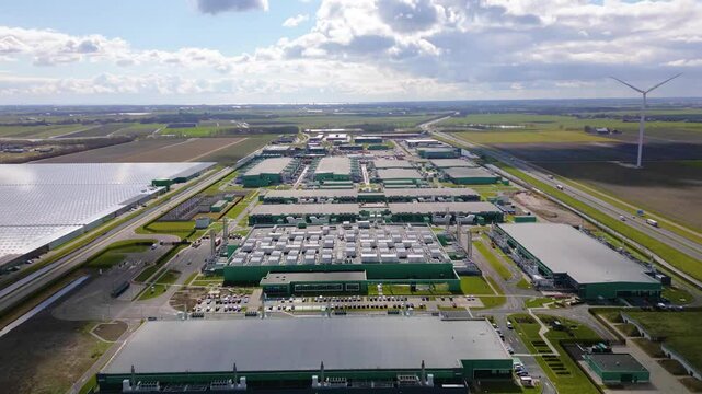 Hyperlapse Aerial view on large scale data center in The Netherlands.