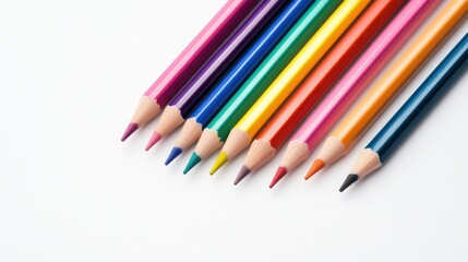 Fototapeta premium Colorful pencil arrangement on white background for creative projects and educational uses