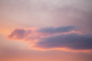 soft hues over the rocky mountains at sunset