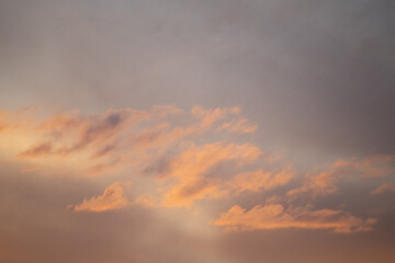 soft hues over the rocky mountains at sunset