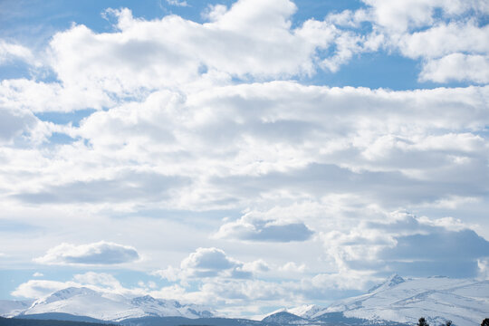 Washed out clouds above the mountains