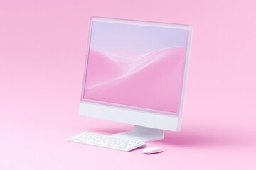 Pastel pink computer on a pink surface