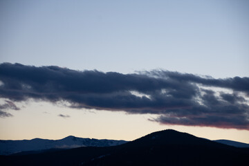 dark clouds at last light