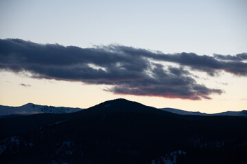 dark clouds at last light