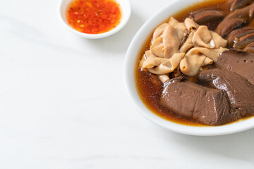 stewed duck offal in brown soup