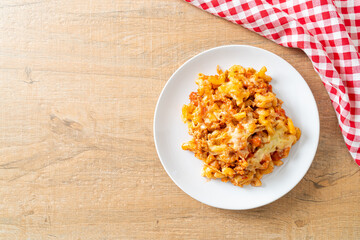 homemade macaroni bolognese with cheese