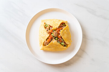 egg wrap or stuffed egg with minced pork and vegetable