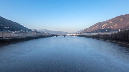 Obraz premium Salzburg River Panorama: Cityscape for Bridge, Mountains.