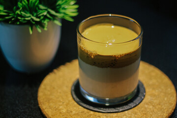 Dalgona coffee or whipped instant coffee. New popular food and drink trend. Trendy drink during Covid-19 city lock down and self quarantine, stay at home concept