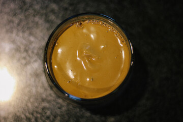 Dalgona coffee or whipped instant coffee. New popular food and drink trend. Trendy drink during Covid-19 city lock down and self quarantine, stay at home concept