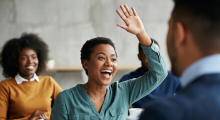 African american woman raising hand in business meeting